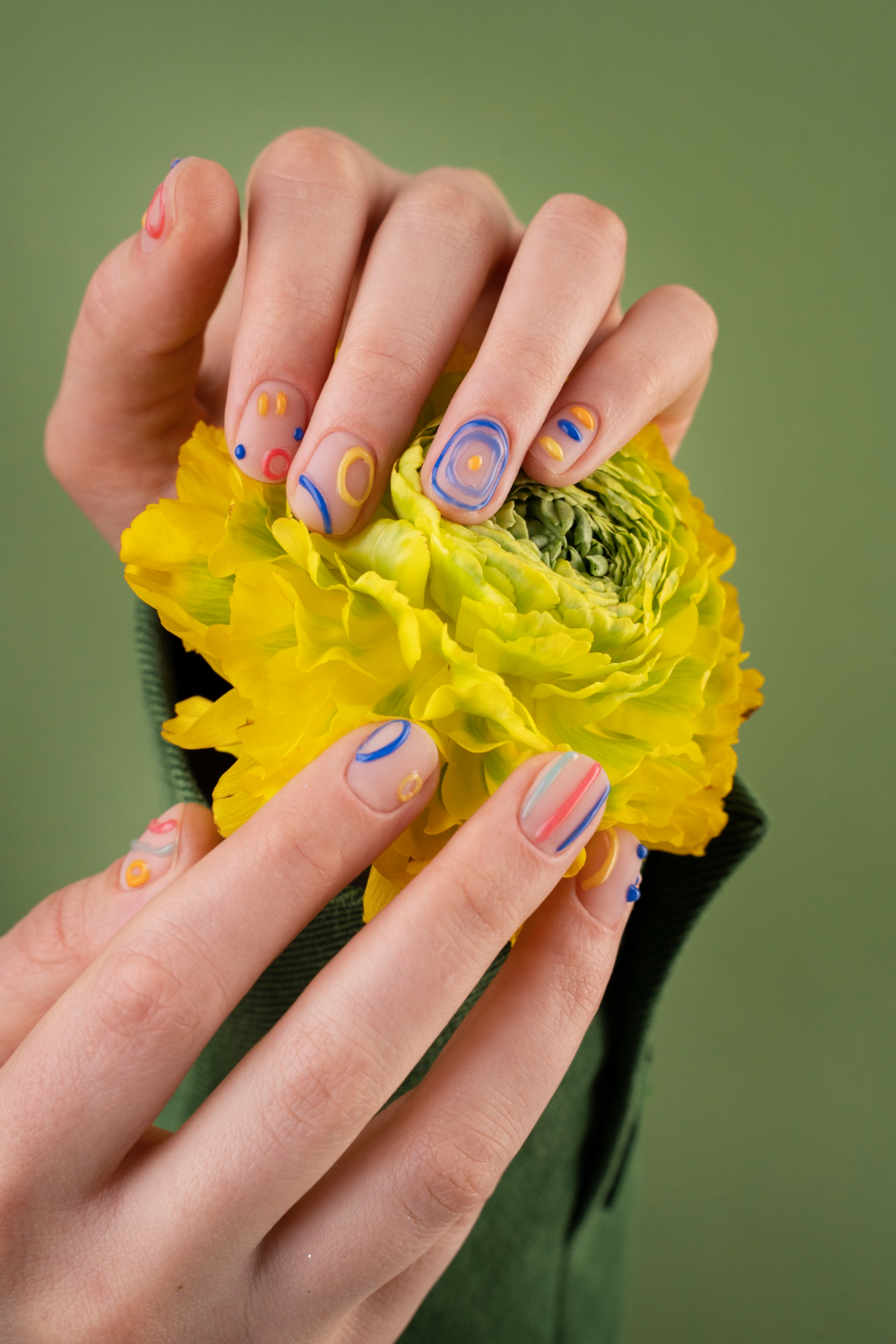 close-up-hands-holding-yellow-flower (1)